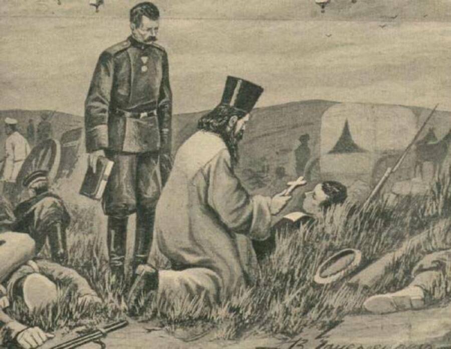 Священник благословляет раненного воина.